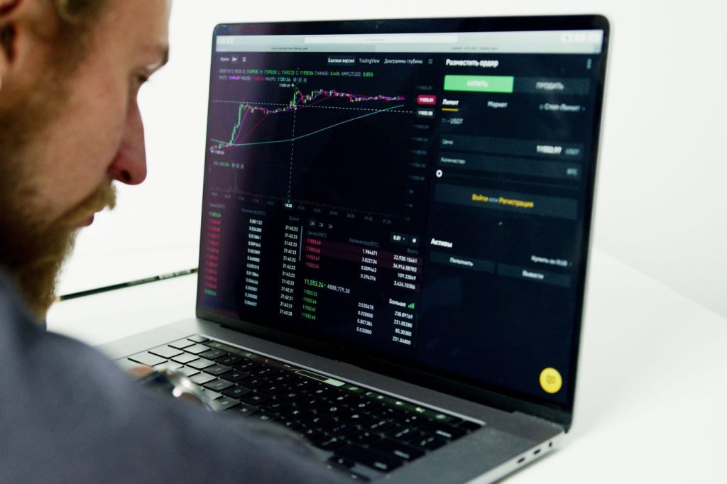a forex trader analyzing a chart